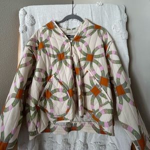 Universal thread quilted jacket